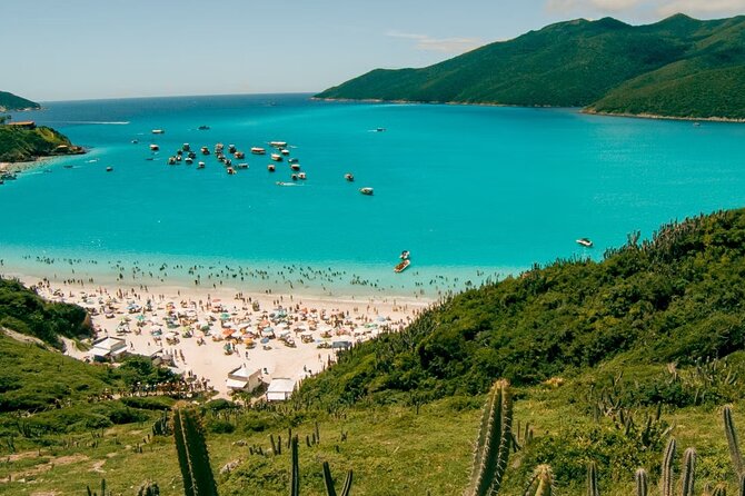 A Day in Arraial do Cabo Guided Tour - Praia dos Anjos: port life, snorkeling-friendly water, and sunset views