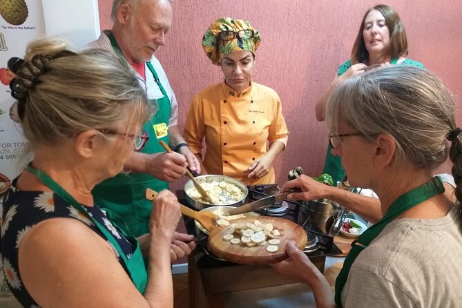 Brazilian Cooking Class in Copacabana with Hotel Pickup - Drinks and the dinner experience: caipirinha, coconut shake, and eating what you made