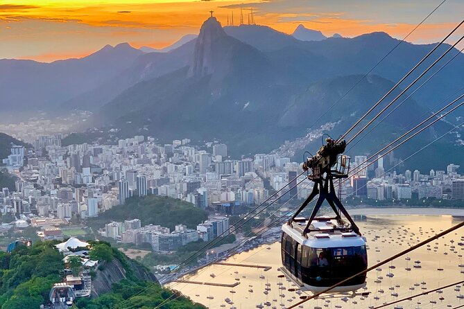 Corcovado Train and Sugarloaf Mountain Guided Tour with Transfer - Corcovado Train ride: a calm 20 minutes to the icon