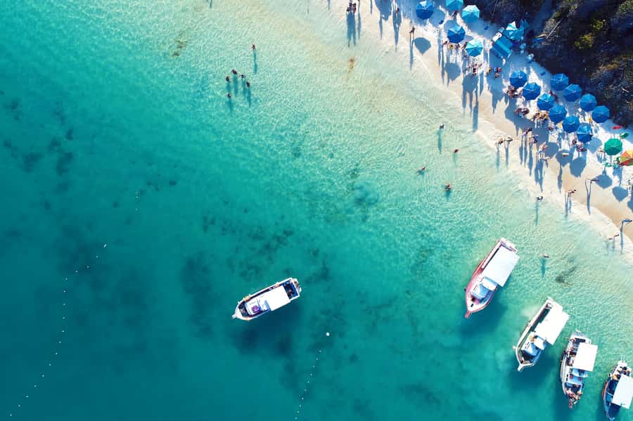 From Rio: Arraial do Cabo Day Trip with Boat Tour - The schooner cruise: sailing, swimming, and how the stops work