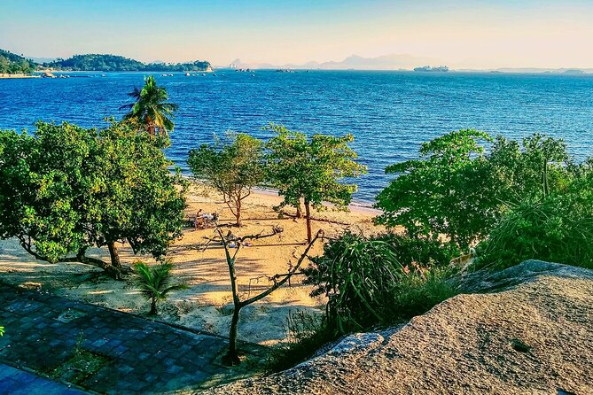 Full-Day Guided Tour of Ilha de Paquetá with Pick Up - Praca Pintor Pedro Bruno: art, a bronze bust, and a quick reset