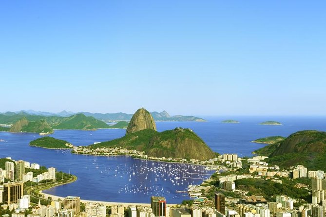 Rio de Janeiro Super Saver: Corcovado and Sugar Loaf Mountain plus Ginga Tropical Show - Morning coastal drive: Leblon, Ipanema, and Copacabana in fast context