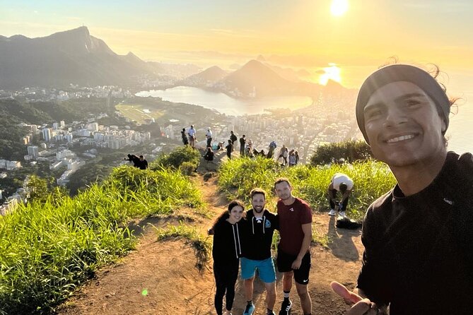 Sunrise and Sunrise Walk Two Brothers with Local Guide - Stop at Morro Dois Irmãos: the summit moment you came for