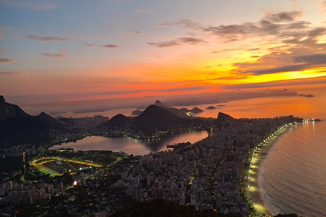 Sunrise Hike to Morro Dois Irmãos with Local Guide - Panoramic stop with Rocinha below you, and São Conrado in the distance