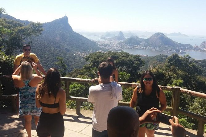 Sunset at Christ the Redeemer:Dona Marta,Selarón Steps& Lage Park - Mirante Dona Marta: panoramic views that help you understand Rio