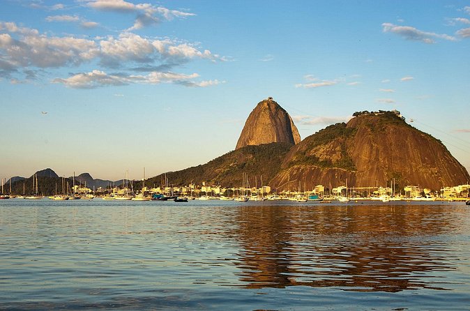Tour 4 ( 8 hours ) : Sugar Loaf , Botanical Garden , Favela and western beaches - Price and value: what $320 per group covers, and what it doesn’t